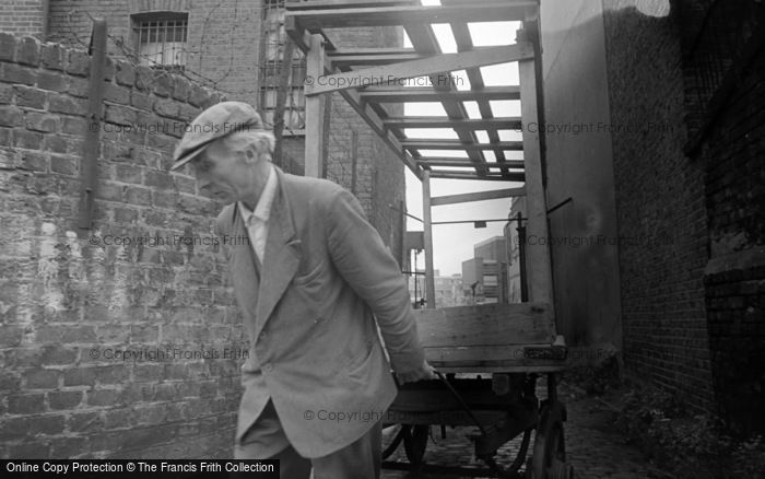 Photo of Hoxton, Man Towing Market Stall 1965