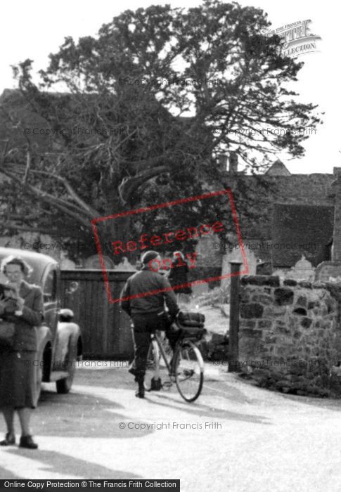 Photo of Amberley, Getting Off Bicycle c.1950