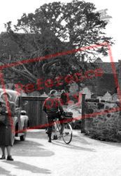 Getting Off Bicycle c.1950, Amberley
