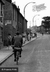 Cycling Up High Street c.1960, Aveley