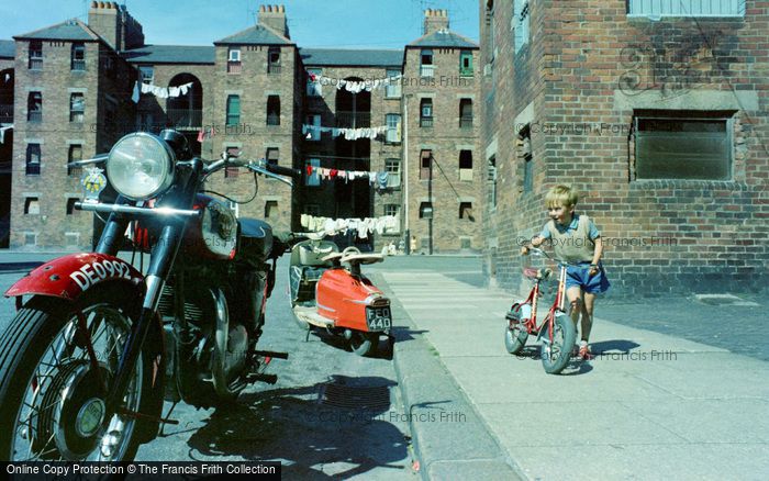 Photo of Barrow In Furness, Bikes, Devonshire Building Tenement Blocks 1963