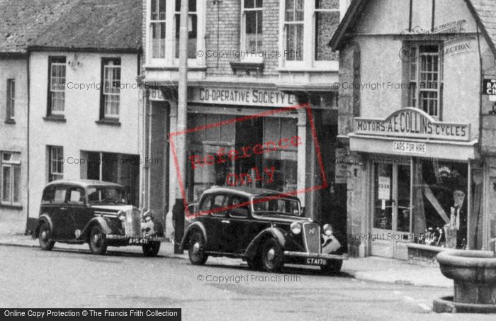 Photo of Bovey Tracey, Co Operative Society And A.E.Collins Cycles And Motors c.1955