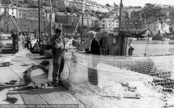 Photo of Brixham, Repairing Nets At The Harbour 1966