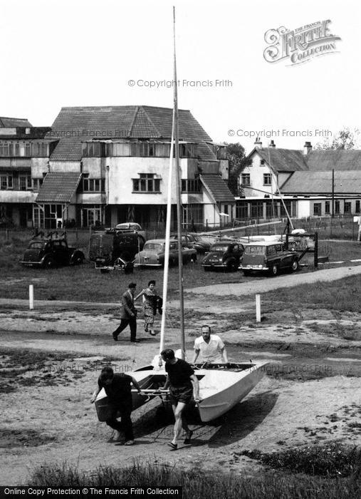 Photo of Canvey Island, Men Carrying A Catamaran Dinghy c.1960