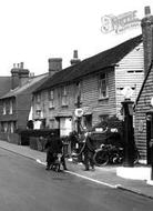 Refuelling The Bike 1928, Capel
