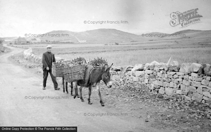 Photo of Carrigart, Donkey Carrying Peat In Baskets 1937