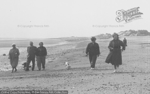 Photo of Chapel St Leonards, Walking Along The Beach c.1955