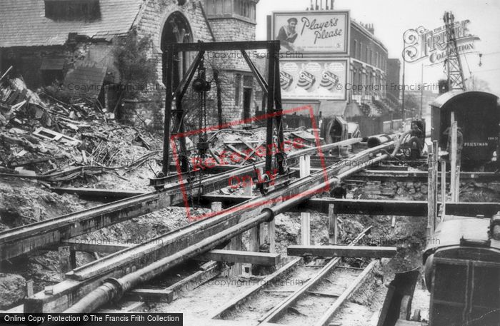 Photo of Charlton, War Damaged Tram Tracks, Woolwich Road 1940