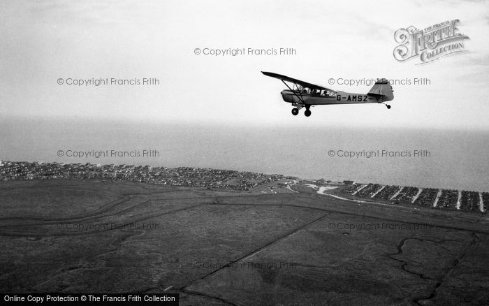 Photo of Clacton On Sea, A Plane Above The Airfield c.1960