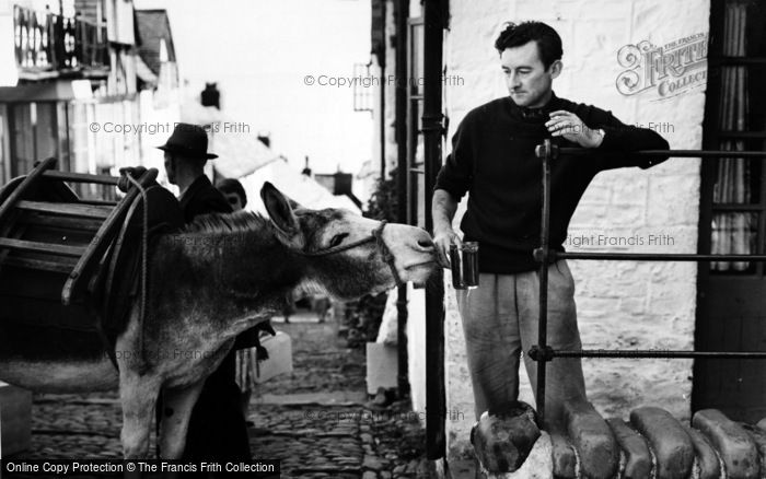 Photo of Clovelly, Donkey Stealing Beer c.1960