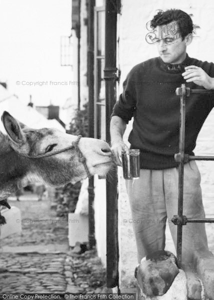 Photo of Clovelly, Donkey Stealing Beer c.1960