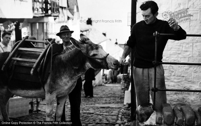 Photo of Clovelly, Donkey Stealing Beer c.1960