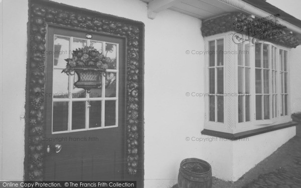 Photo of Clovelly, The Carved Wood Door And Window c.1940
