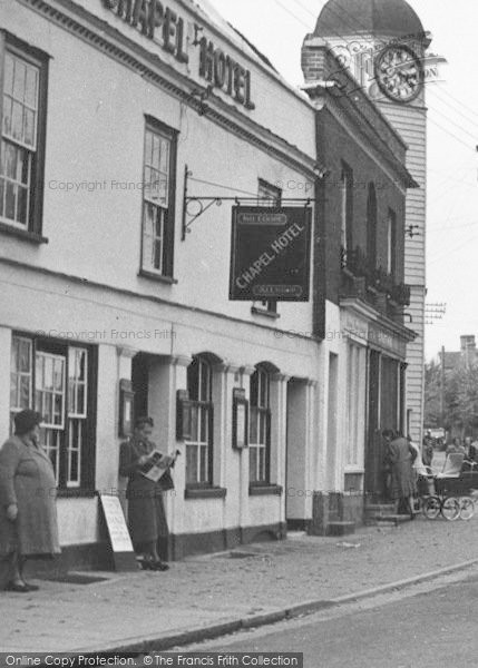 Photo of Coggeshall, Chapel Hotel And Clock Tower c.1955