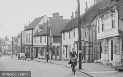 Cyclist In Church Street c.1955, Coggeshall