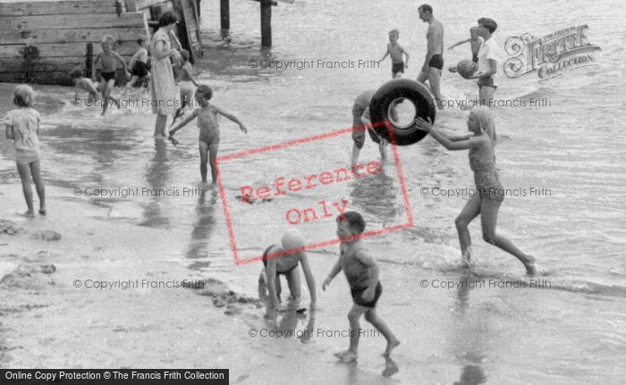 Photo of Colwell Bay, Families Playing On The Beach c.1955