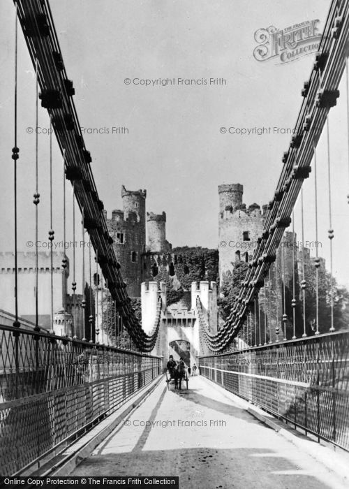 Photo of Conwy, Crossing The Suspension Bridge c.1910