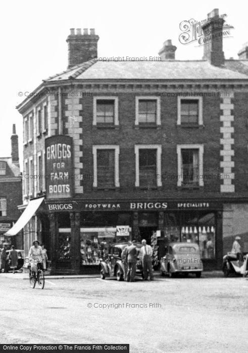 Photo of Dereham, Briggs' Shop, Market Square c.1955