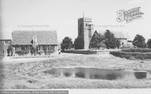 Photo of Ducklington, The Pond And Church c.1955