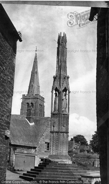 Photo of Geddington, Queen Eleanor Cross And Church c.1955
