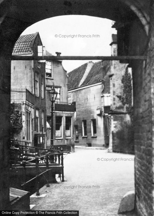 Photo of Gouda, Achter De Kerk Through Buttress Arch Of Sint Janskerk c.1930