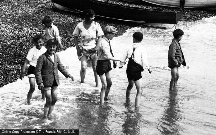 Photo of Hastings, Enjoying A Paddle 1925