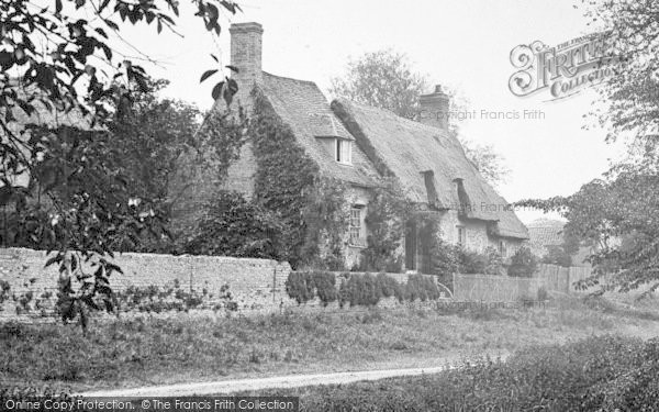 Photo of Holywell, Front Of Thatched Cottage 1914
