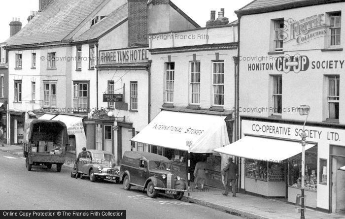 Photo of Honiton, High Street Shops And The Three Tuns Hotel c.1955