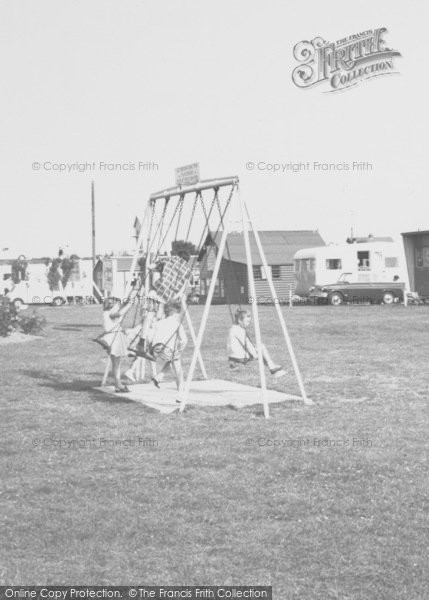 Photo of Ingoldmells, Caravan Site, The Swings c.1965