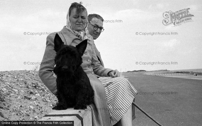 Photo of Ingoldmells, Holidaymakers With Dog On The Seawall c.1955