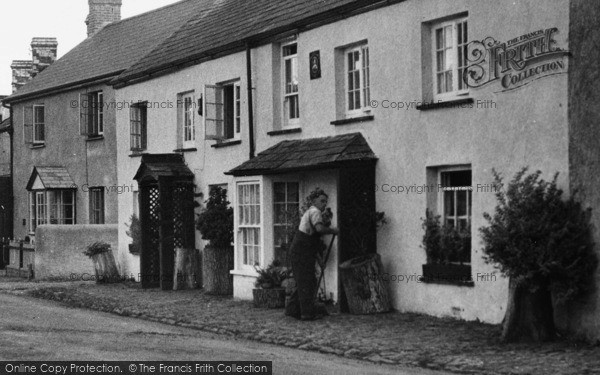 Photo of Kilkhampton, Main Street, Sweeping The Pavement 1949