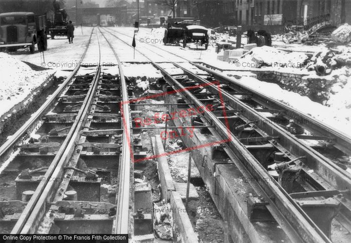 Photo of London, Damaged Tram Tracks In The Snow c.1940