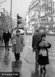 Pedestrians In The Rain c.1964, London