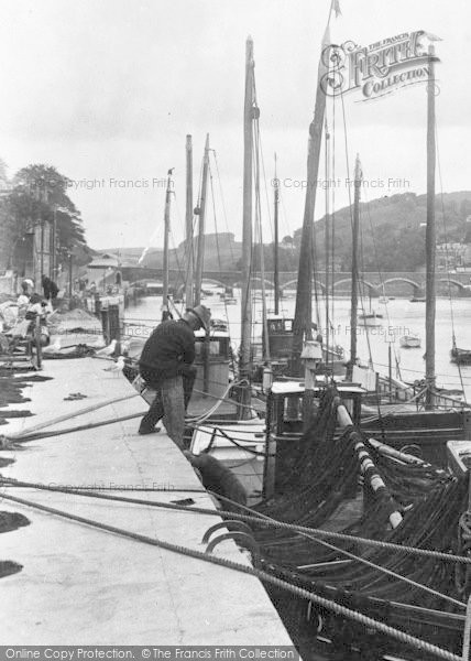 Photo of Looe, Man Sitting On Mooring Post 1931