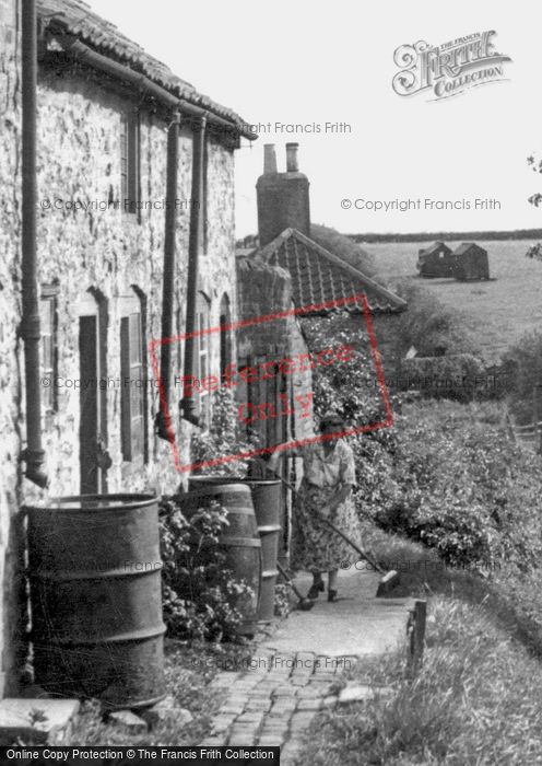 Photo of Ludford Magna, Sweeping The Front Path, Fanny Hands Lane c.1955