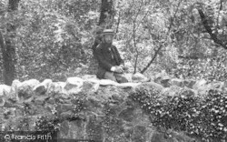 A Man Sitting On Weir Bridge 1907, Lustleigh