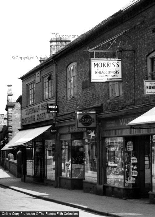Photo of Market Drayton, Shops On Cheshire Street c.1955