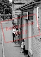 Women Chatting, High Street c.1955, Metheringham