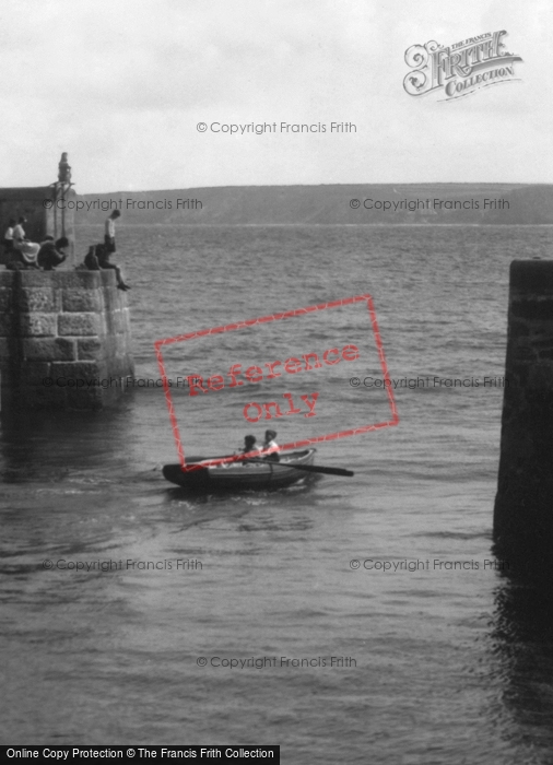 Photo of Newquay, Rowing Through Harbour Entrance 1921