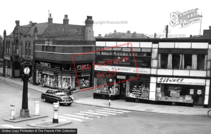 Photo of Normanton, Market Place Shops And Clock c.1965