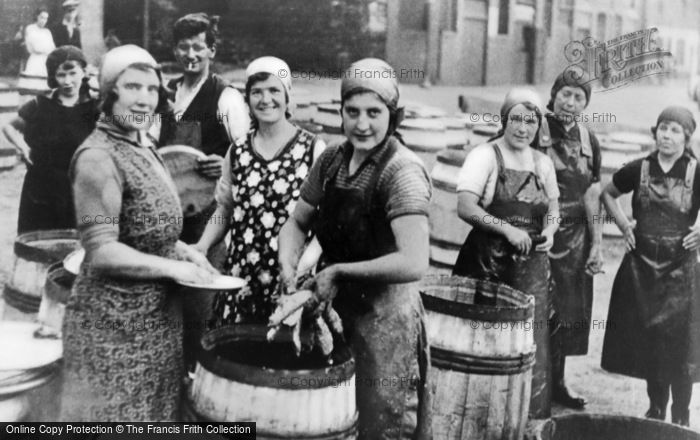 Photo of North Shields, Scots Fisher Girls Salting Herring c.1930