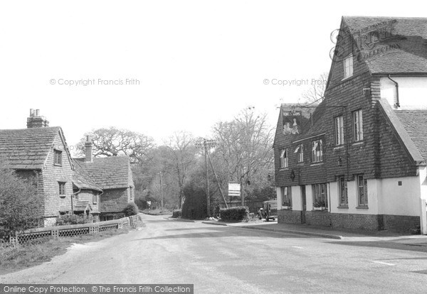 Photo of Ockley, The Kings Arms And Main Street c.1955