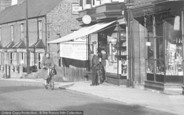 Photo of Oulton Broad, Cycling Up Bridge Road c.1955