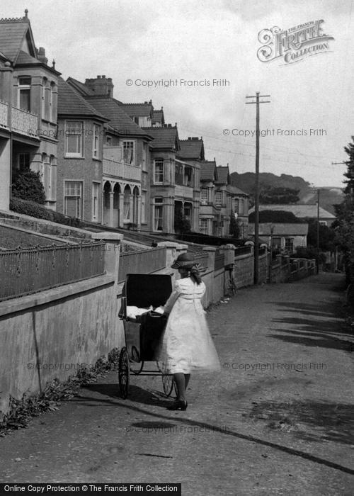 Photo of Padstow, Girl And Pram In Dennis Road 1920