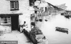 A Woman Sewing By The Harbour c.1955, Polperro