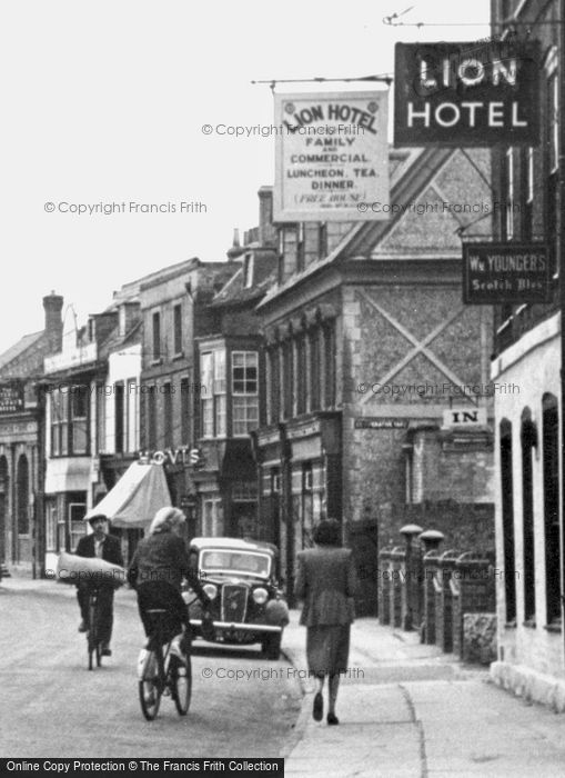 Photo of Ramsey, Passing By The Lion Hotel, High Street c.1955