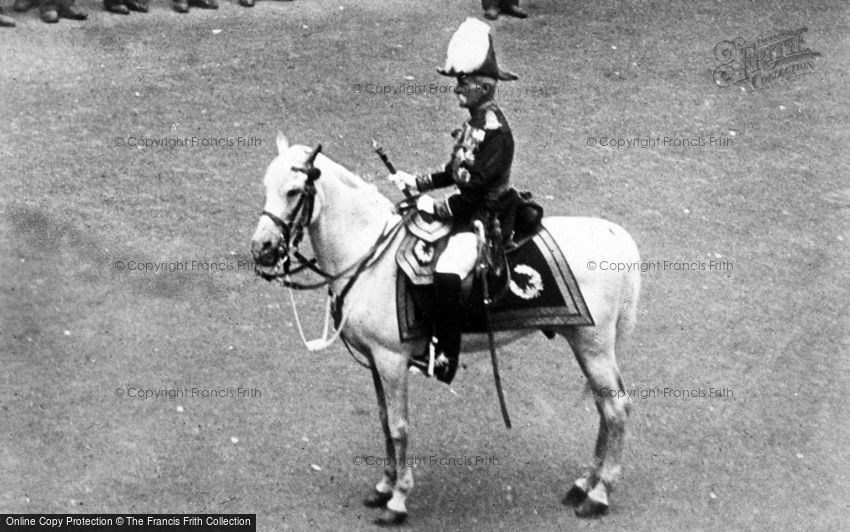 Royalty, a Mounted Guard c1900