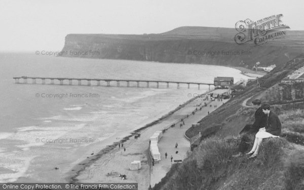 Photo of Saltburn By The Sea, A Young Couple Looking Down The Beach 1927