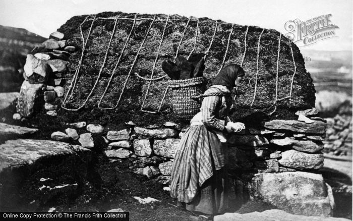 Photo of Shetland, Island Woman Carrying Peat c.1890