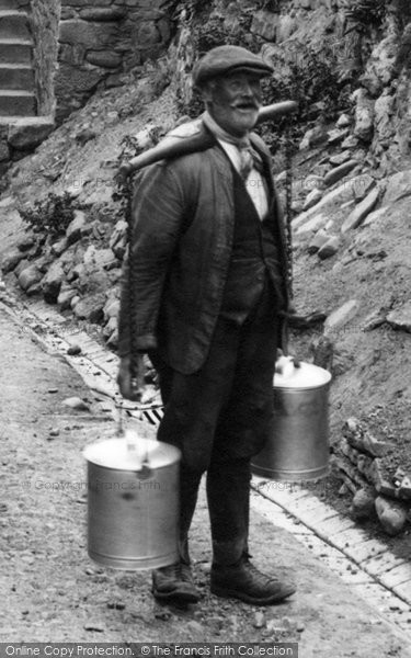 Photo of Staithes, Man Carrying Milk With A Yoke 1925